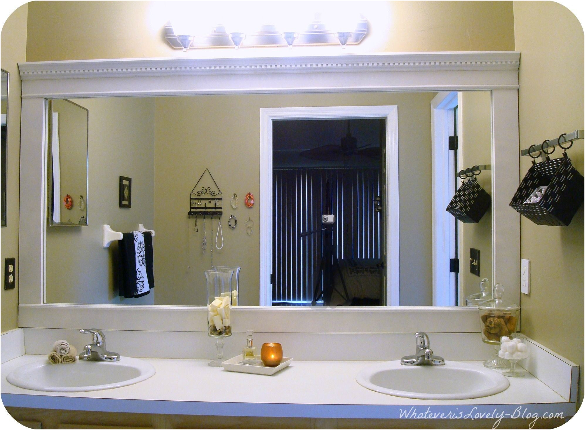 Elegant Framing Out A Mirror In Bathroom