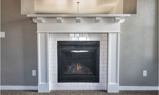 Tile Fireplace Surround Ideas Elegant Cozy Up to This Fireplace Surrounded with White Subway Tile